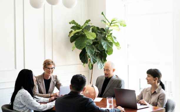 Happy business people in a meeting Happy business people in a meeting