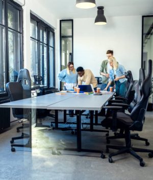 featured-image-1783310433 Diverse group of young business people working on new project together in office.